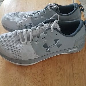 Gray Under Armour tennis shoes